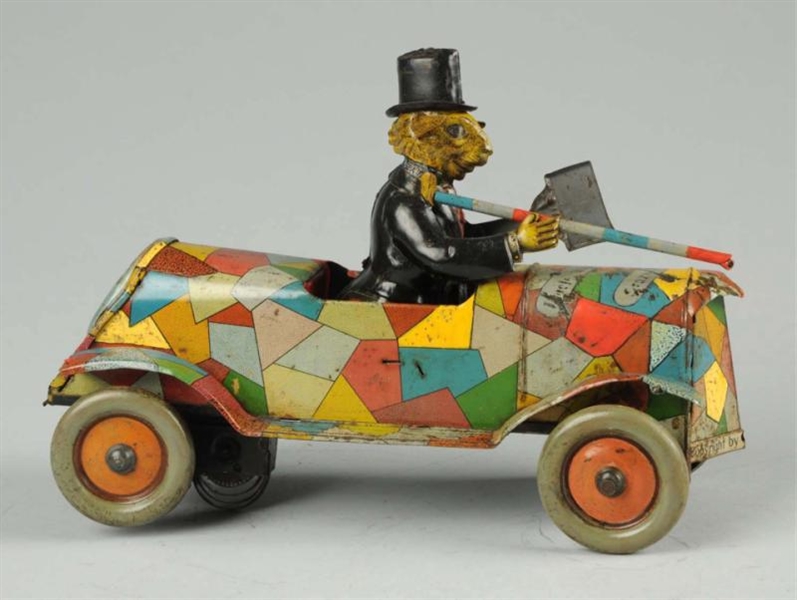 GERMAN TIN LITHO WIND-UP UNCLE WIGGLY CRAZY CAR.  