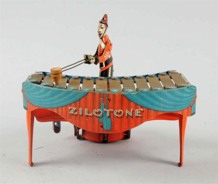 WOLVERINE TOY CLOWN PLAYING THE ZILOTONE.         
