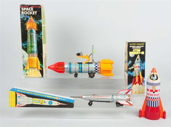 LOT OF 3: FOREIGN MADE SPACE ROCKET TOYS.         
