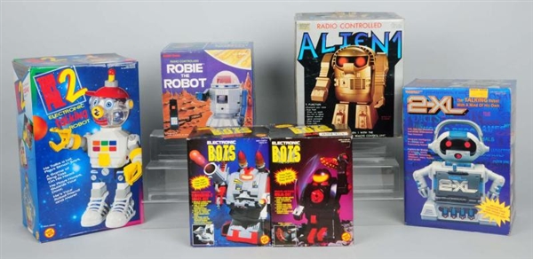 LOT OF 6: BATTERY OPERATED ROBOT TOYS.            
