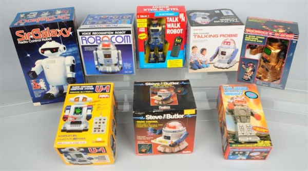 LOT OF 8: CONTEMPORARY TOY ROBOTS & SPACE TOYS.   