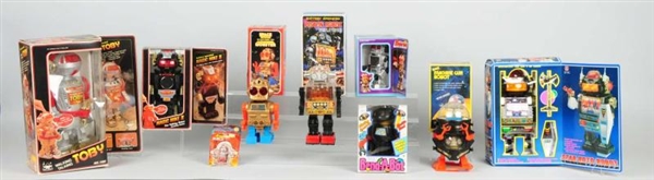 LOT OF 9: BATTERY OPERATED ROBOT TOYS.            