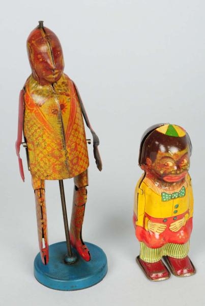 LOT OF 2: TIN LITHO AFRICAN AMERICAN TOYS.        