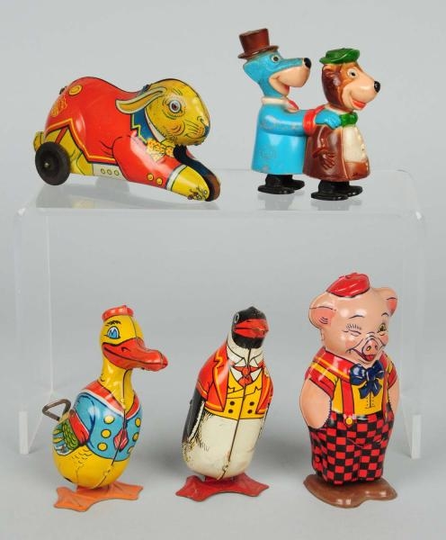 LOT OF 5: TIN LITHO & PLASTIC CHARACTER TOYS.     