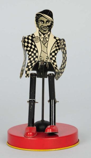AMERICAN MADE TIN LITHO DANCING TOY.              