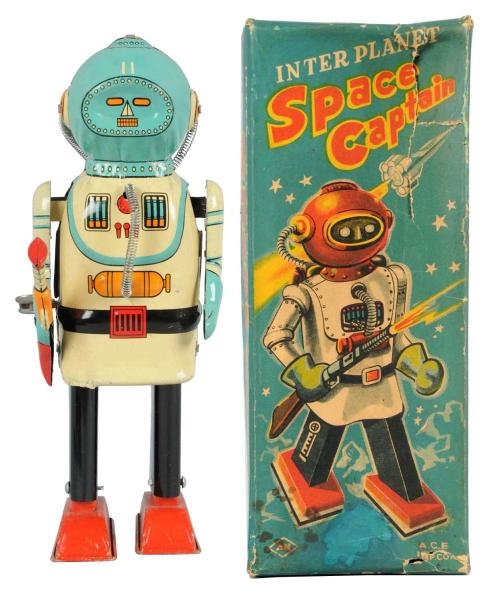 TIN LITHO WIND-UP INTER PLANET SPACE CAPTAIN.     