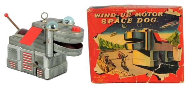TIN LITHO & PAINTED WIND-UP SPACE DOG.            