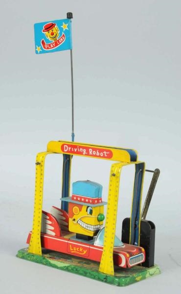 TIN LITHO WIND-UP DRIVING ROBOT.                  