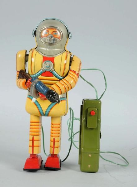 TIN LITHO EARTH MAN BATTERY OPERATED.             