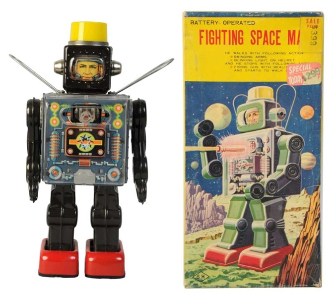 TIN LITHO & PAINTED FIGHTING SPACE MAN.           
