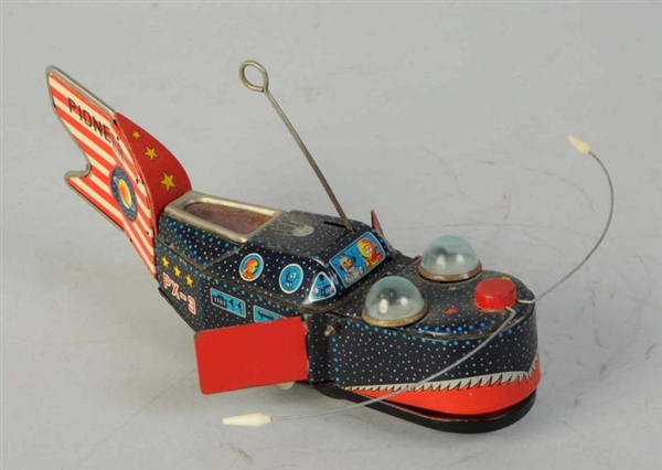 TIN LITHO WIND-UP SPACE WHALE.                    