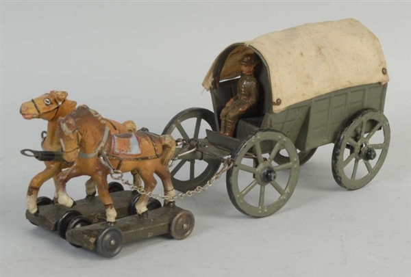 LINEOL HORSE-DRAWN MILITARY COVERED WAGON.        