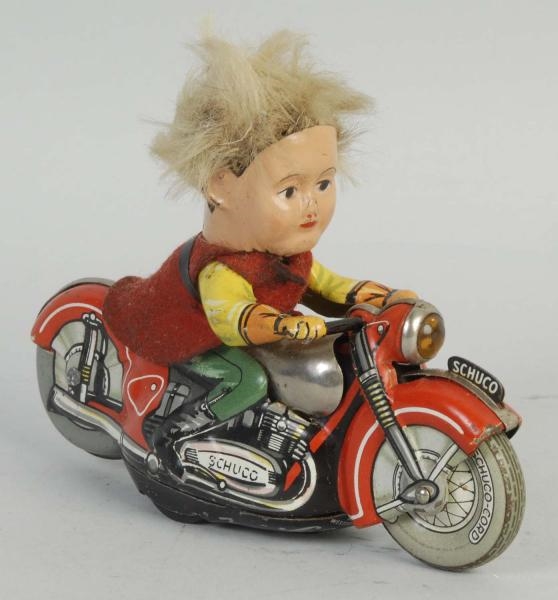 GERMAN SCHUCO PETER MOTORCYCLE TOY.               