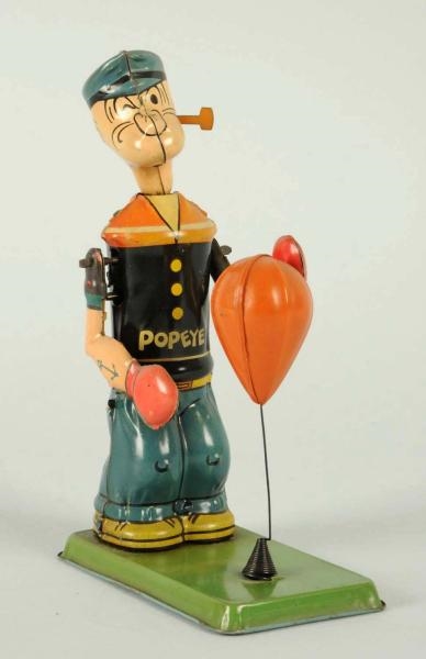 CHEIN POPEYE WITH PUNCHING BAG TOY.               