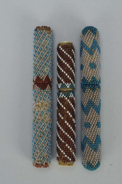 LOT OF 3: BEADED SEWING NEEDLE CASES.             