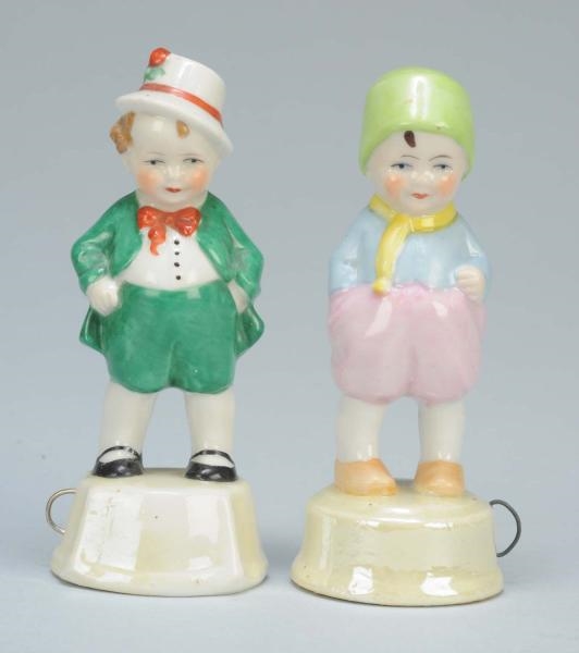 LOT OF 2: PORCELAIN FIGURAL SEWING TAPE MEASURES. 