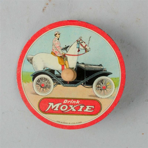 1920 MOXIE TIN SPINNER.                           
