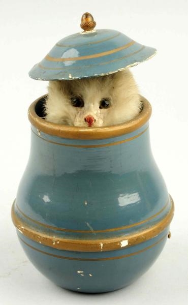 CAT IN KETTLE MECHANICAL TOY.                     