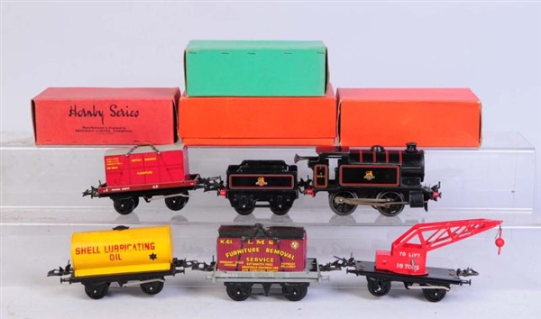 HORNBY LOCOMOTIVE & TENDER WITH FREIGHT CARS.     
