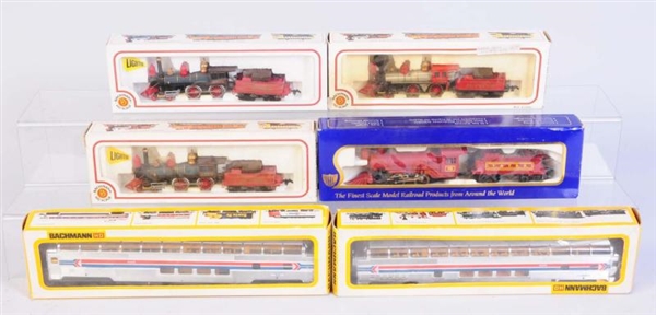 LIONEL HO ASSORTED TRAINS.                        