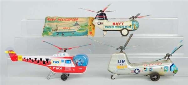 LOT OF 3: TIN JAPANESE HELICOPTER TOYS.           