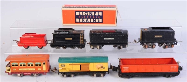 LOT OF 4: PRE-WAR TENDERS & FREIGHT CARS.         