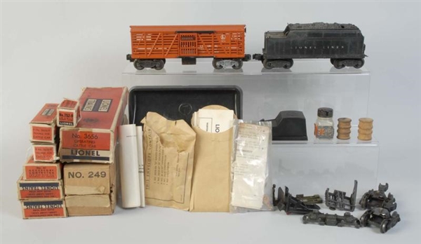 LIONEL TENDER, CATTLE CAR & OTHERS.               