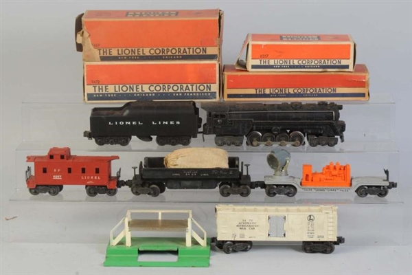 LIONEL NO.671RR & 4 ASSORTED FREIGHT CARS.        