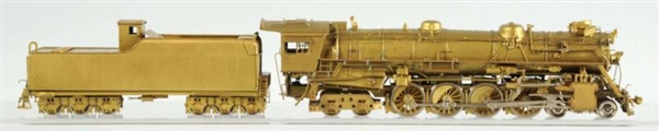 BRASS HO TRAIN ENGINE WITH TENDER.                