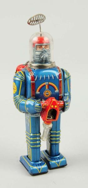 VINTAGE SPACE BATTERY OPERATED CONQUEROR ROBOT.   