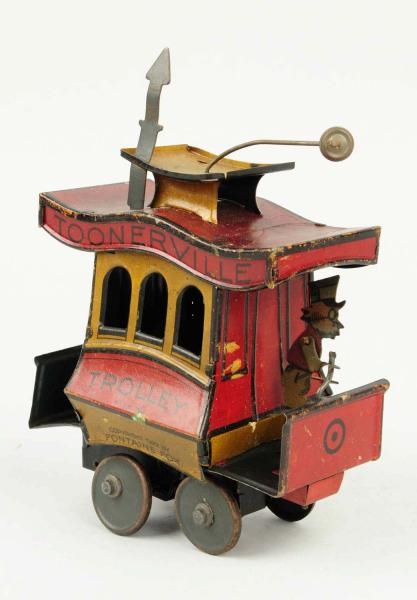 NIFTY TIN LITHO WIND-UP TOONERVILLE TROLLEY.      