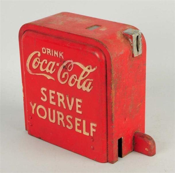 1950S COCA-COLA COOLER COIN BOX.                  