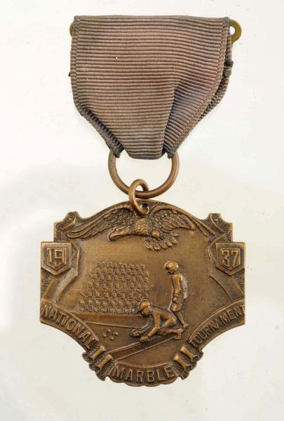 MARBLE TOURNAMENT MEDAL.                          