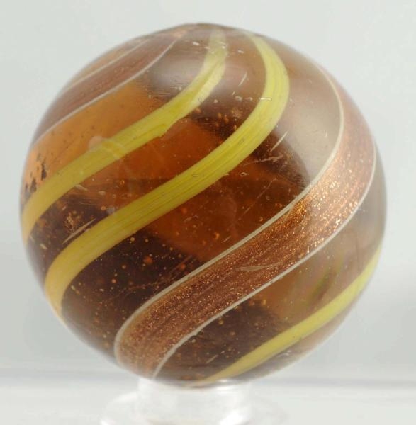LARGE AMBER GLASS BANDED LUTZ MARBLE.             