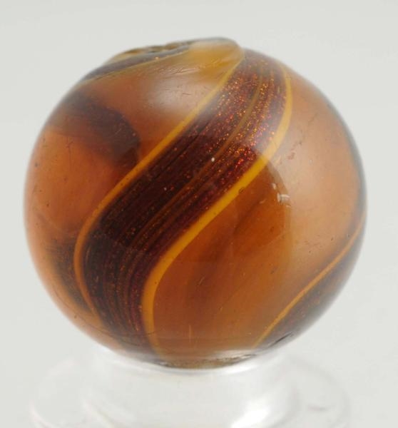AMBER GLASS RIBBON LUTZ MARBLE.                   