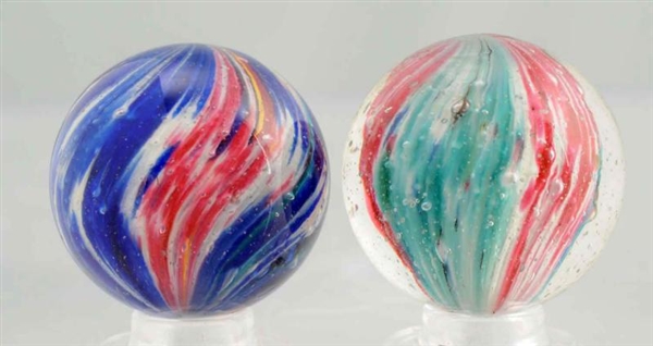 LOT OF 2: FOUR PANELED ONIONSKIN MARBLES.         