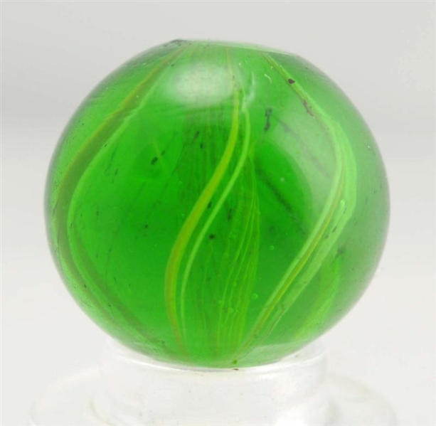 GREEN GLASS LATTICINO SWIRL MARBLE.               