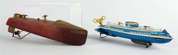 LOT OF 2: WIND-UP BOAT TOYS.                      