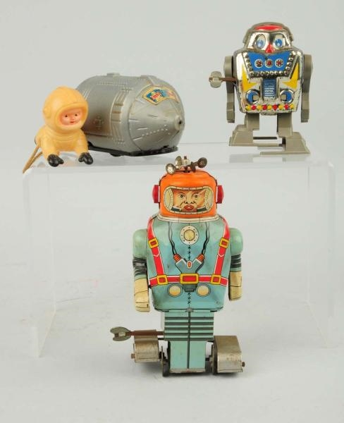 LOT OF 3: TIN LITHO & PLASTIC FOREIGN SPACE TOYS. 