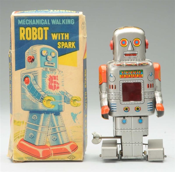 TIN S.Y. WIND-UP MECHANICAL ROBOT WITH SPARK.     