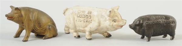 LOT OF 3: CAST IRON PIG BANKS.                    