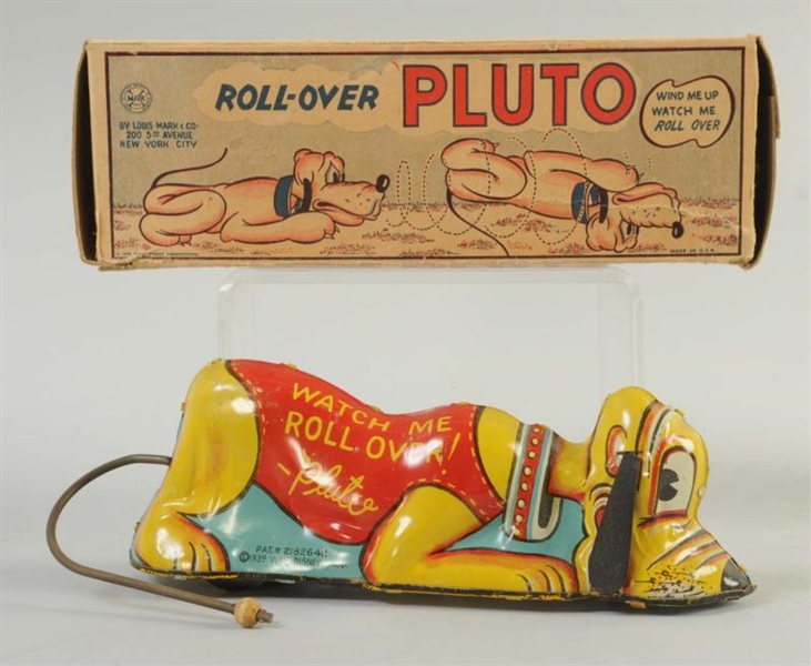 MARX TIN WIND UP ROLL - OVER PLUTO.               