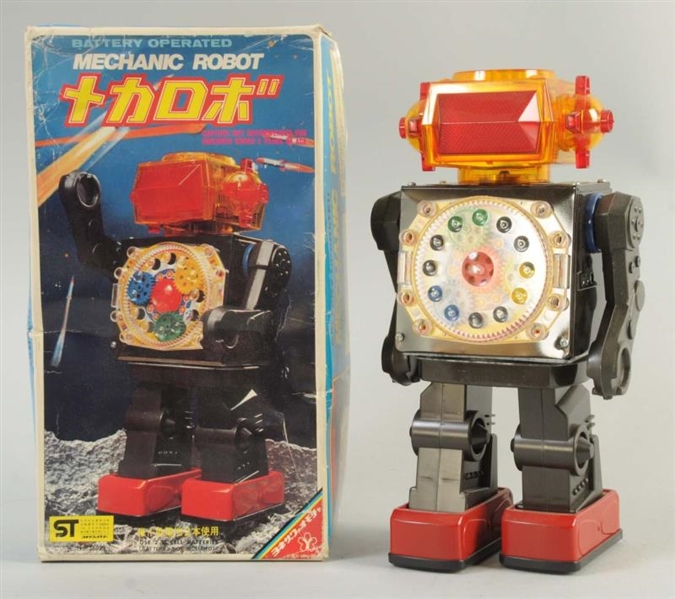 TIN & PLASTIC BATTERY OPERATED MECHANICAL ROBOT.  