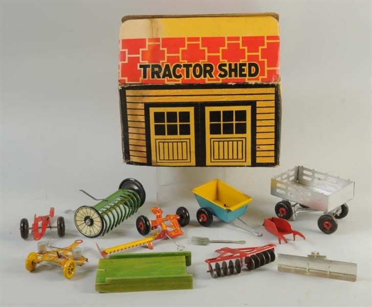 MARX TIN LITHO TRACTOR SHED.                      