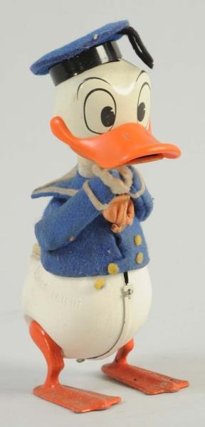 WIND - UP DONALD DUCK TOY.                        