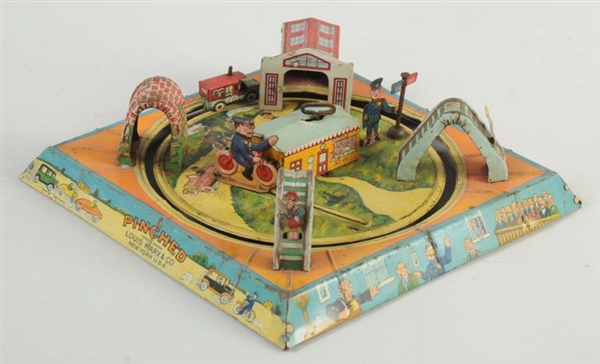 MARX TIN WIND-UP PINCHED TOY.                     