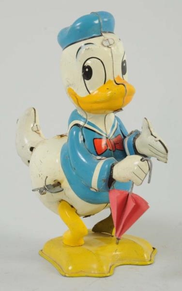 JAPANESE TIN LITHO WIND-UP WHIRL-TAIL DONALD DUCK 