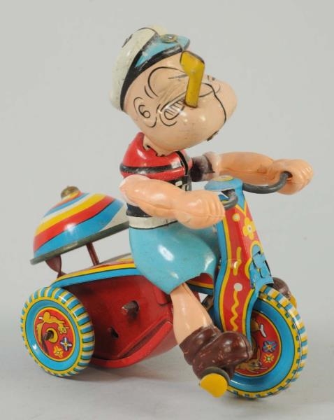 JAPANESE TIN LITHO WIND-UP POPEYE CYCLIST TOY.    