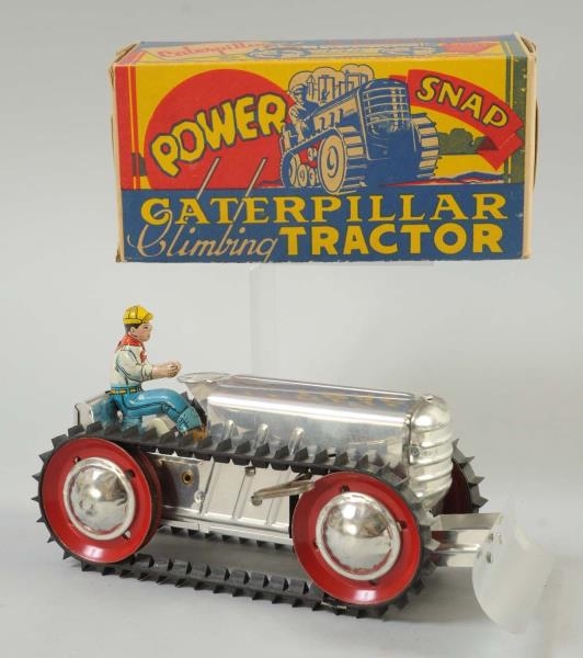 MARX TIN WIND-UP CLIMBING TRACTOR TOY.            