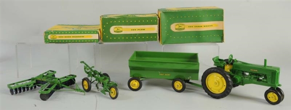 LOT OF 4: DIECAST AND TIN JOHN DEERE TOYS.        